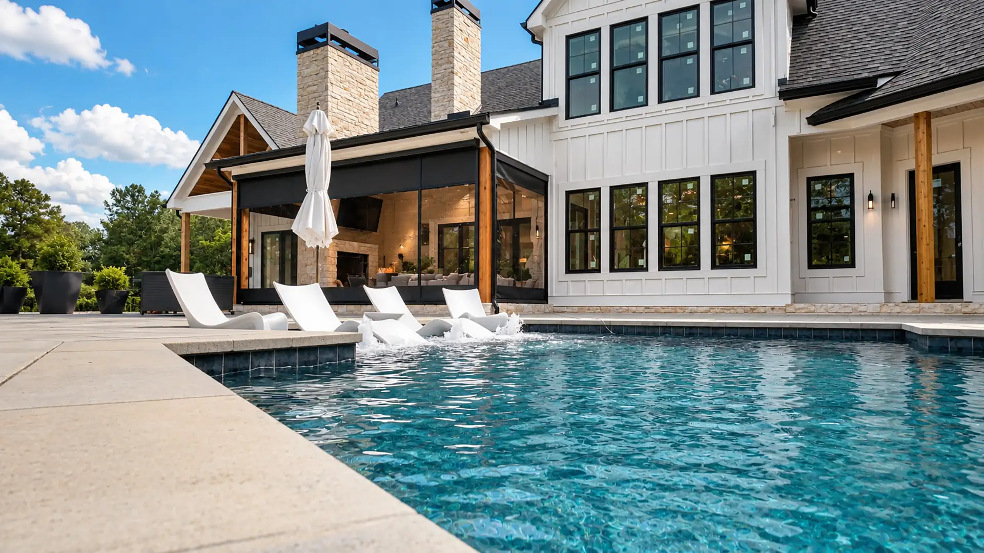 MagnaTrack motorized retractable screens enclosing a luxury outdoor living space