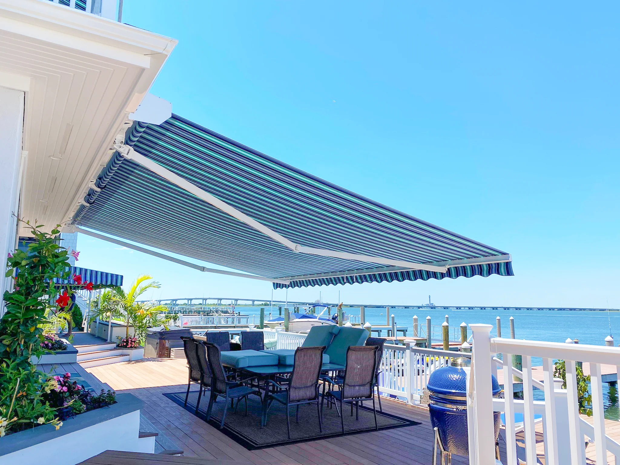 Total Eclipse Retractable Awning providing expansive shade coverage for a large outdoor space